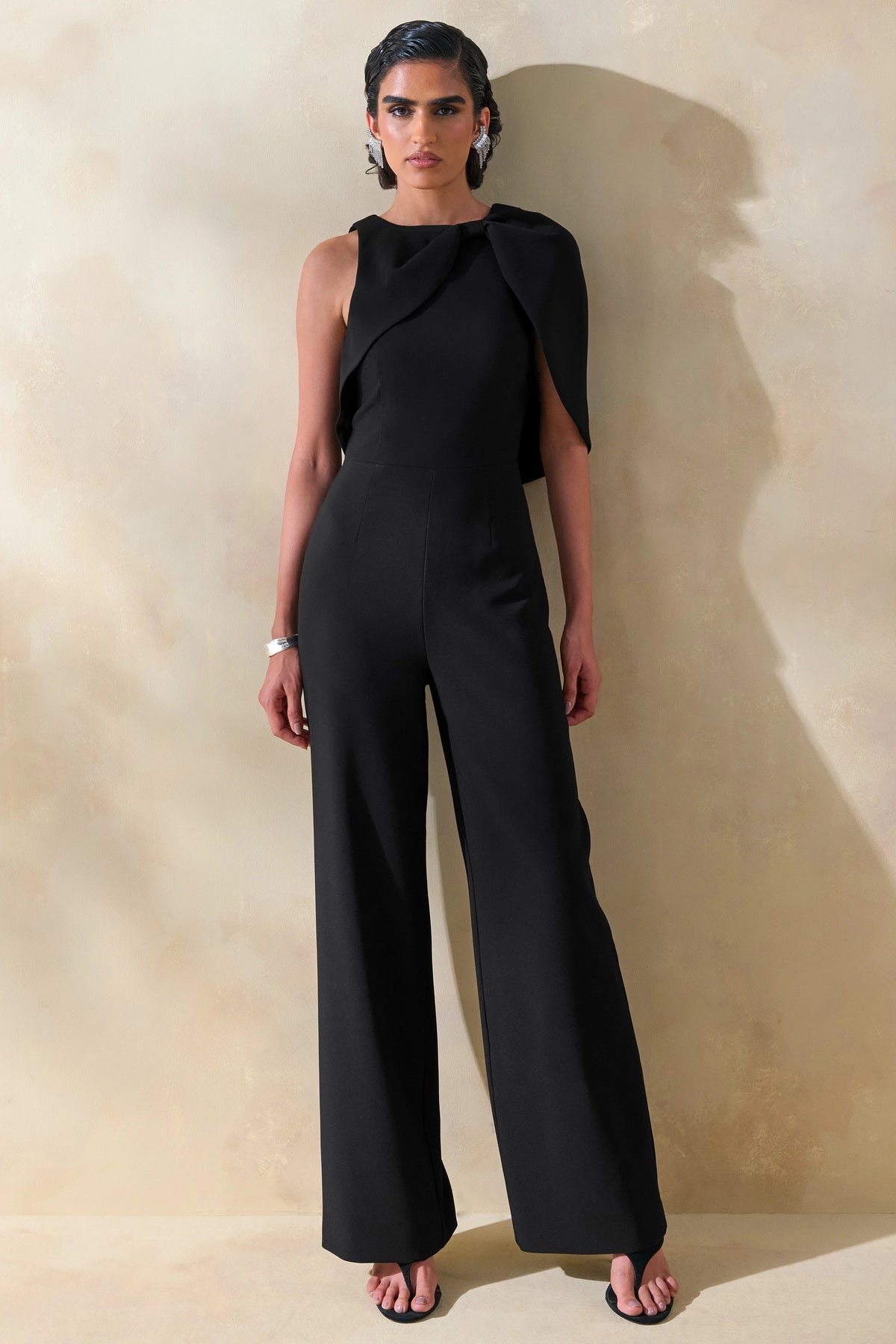 Quinley | Black Asymmetric-Neck Jumpsuit With Cape-Sleeve